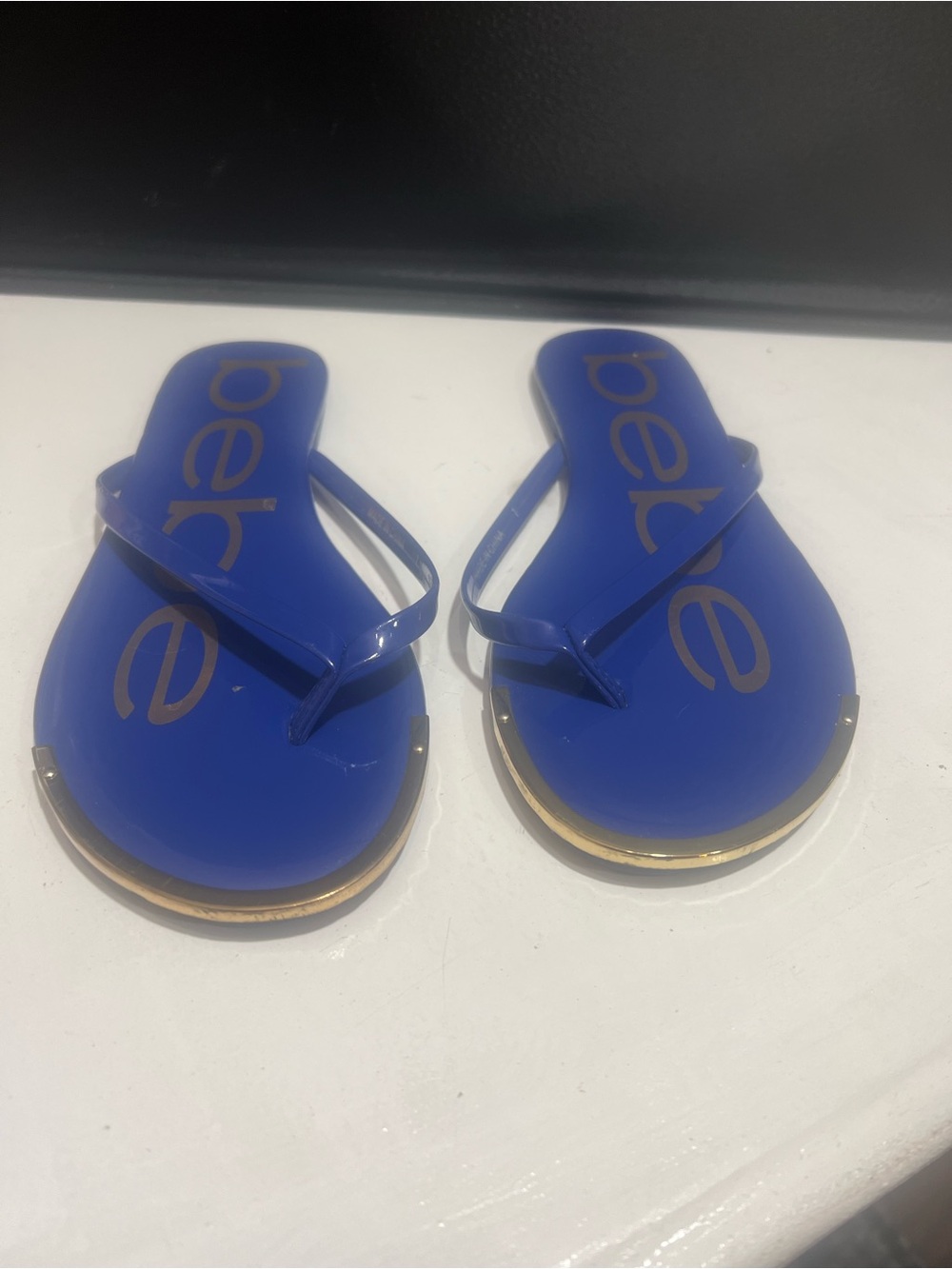Bebe Royal Blue Patent Flip Flop with Gold Logo